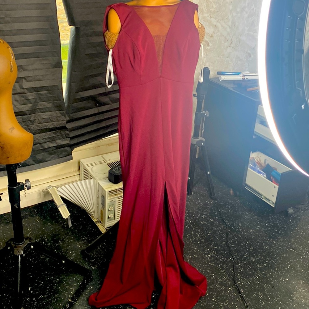 Burgundy bridesmaid dress with split up the front mesh area in the breast size 8